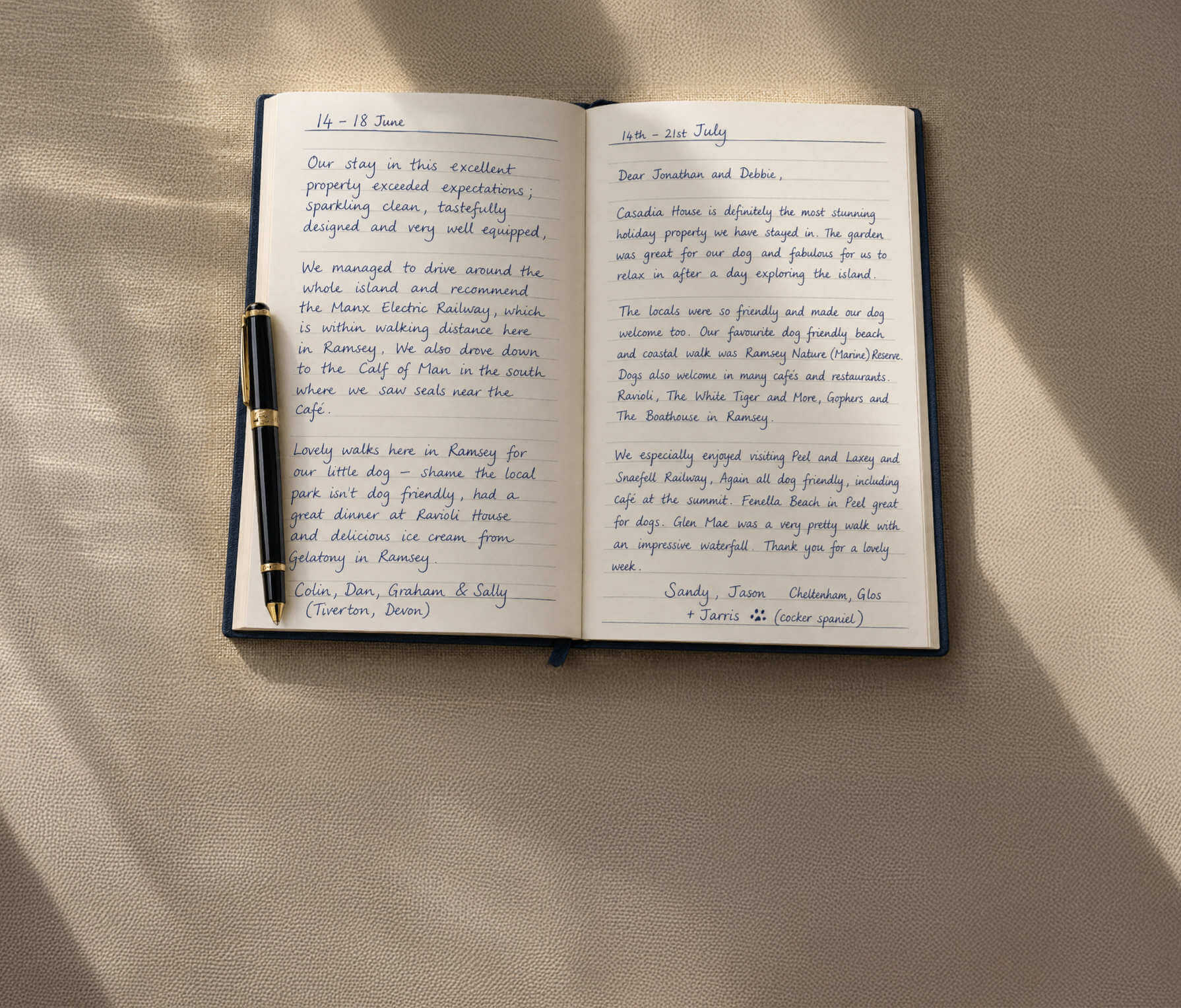 Open Cascadia House guest book with handwritten visitor messages